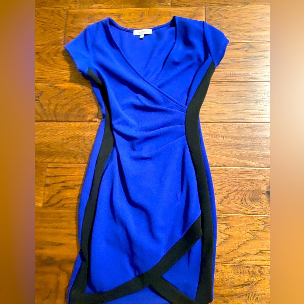 Dress is by Crave fame In a beautiful shade of blue.